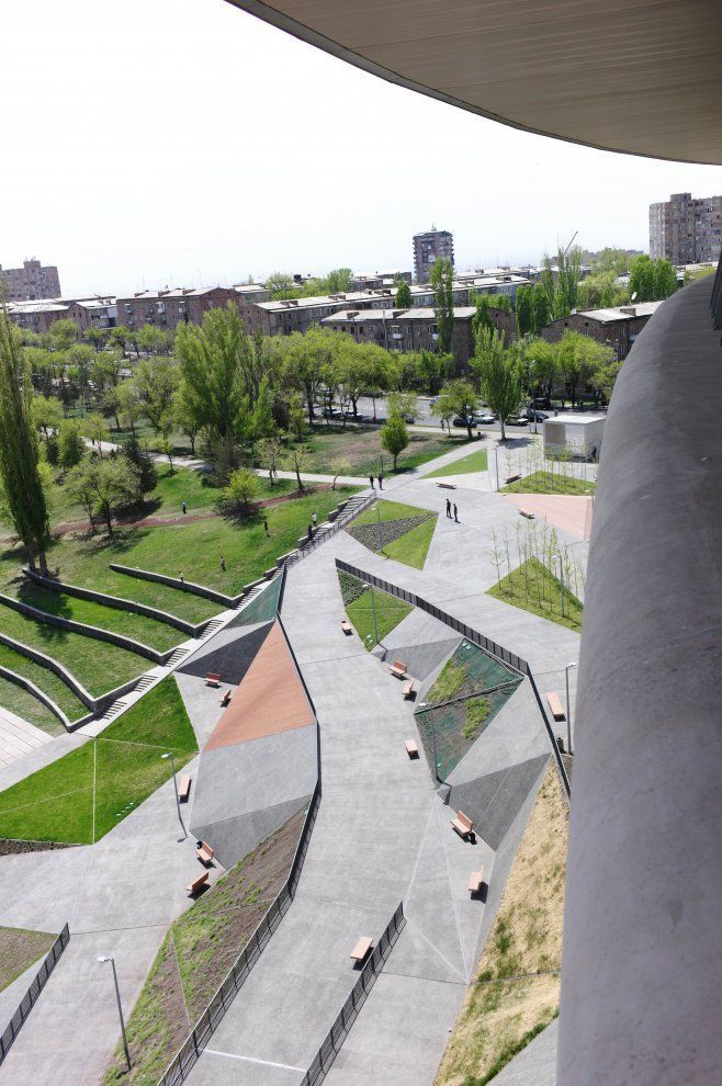 an aerial view of a skate park with ramps