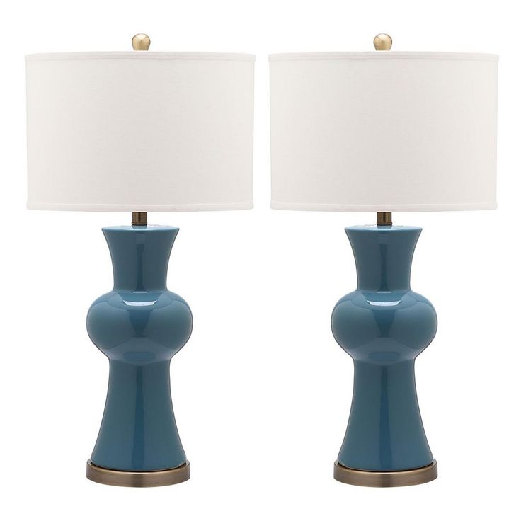 "With their hourglass figures, these Lola column lamps are an elegant and simple lighting solution for your home.PRODUCT FEATURES Curved design lends completely unique appeal. WHAT'S INCLUDED Two lamps: 30\"H x 15\"W x 15\"D (each) Shade: cotton Base: ceramic Spot clean Requires one 100-watt \"CFL\" bulb each (included) Assembly required MODEL NUMBERS Navy: LIT4150A-SET2 White: LIT4150B-SET2 Blue: LIT4150C-SET2 Orange: LIT4150D-SET2 Size: One Size. Gender: unisex. Age Group: adult." Column Table, Cfl Bulbs, Lamp Set, Table Lamp Sets, Simple Lighting, White Table Lamp, White Table, Lamp Sets, Modern Room