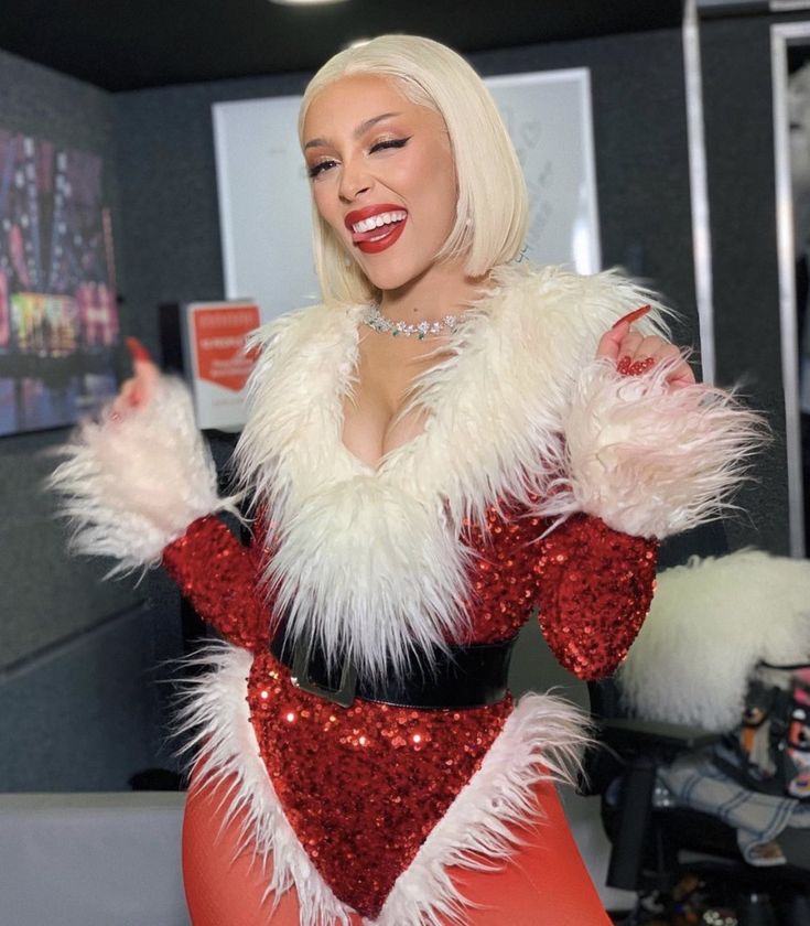 lady in red and white costume posing for the camera