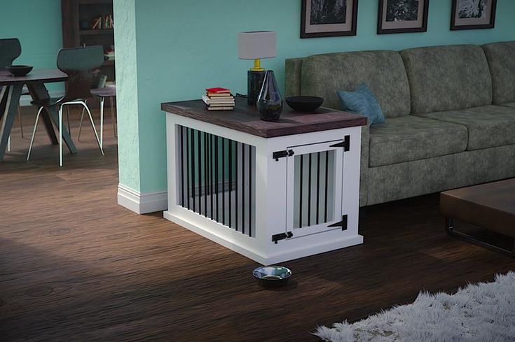 a living room with a couch, coffee table and other items on the floor in front of it