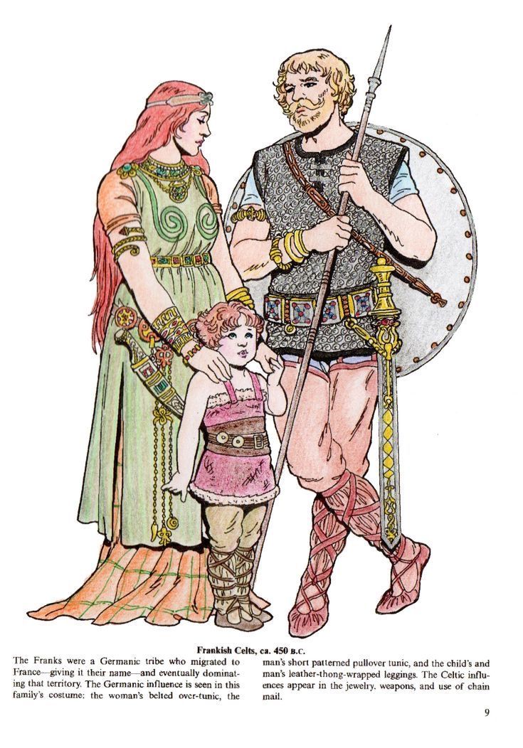 an image of a man and woman in roman costumes with a child standing next to them