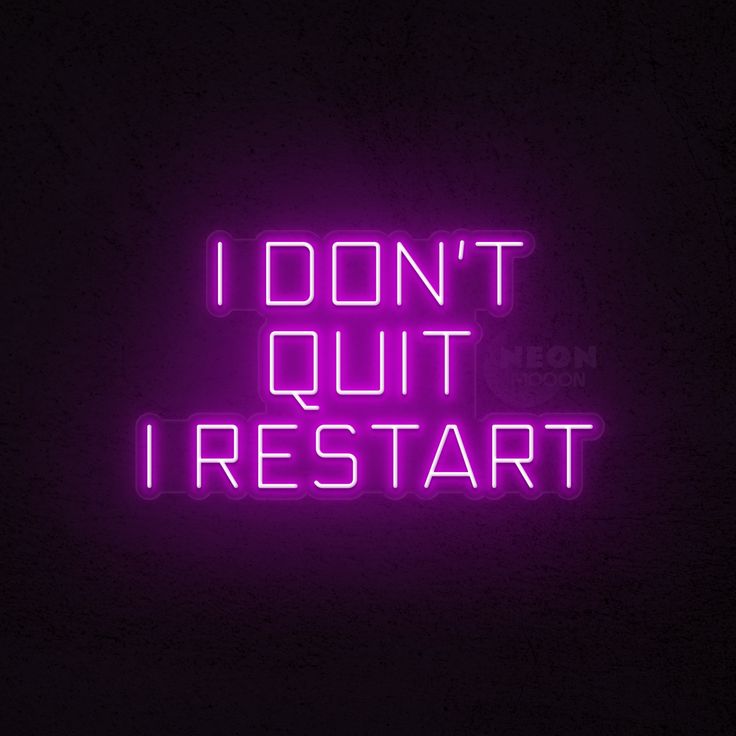 a neon sign that says i don't quit, i restart