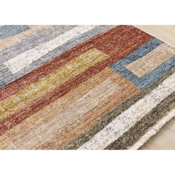 a multicolored area rug is shown on a wooden floor with a white background