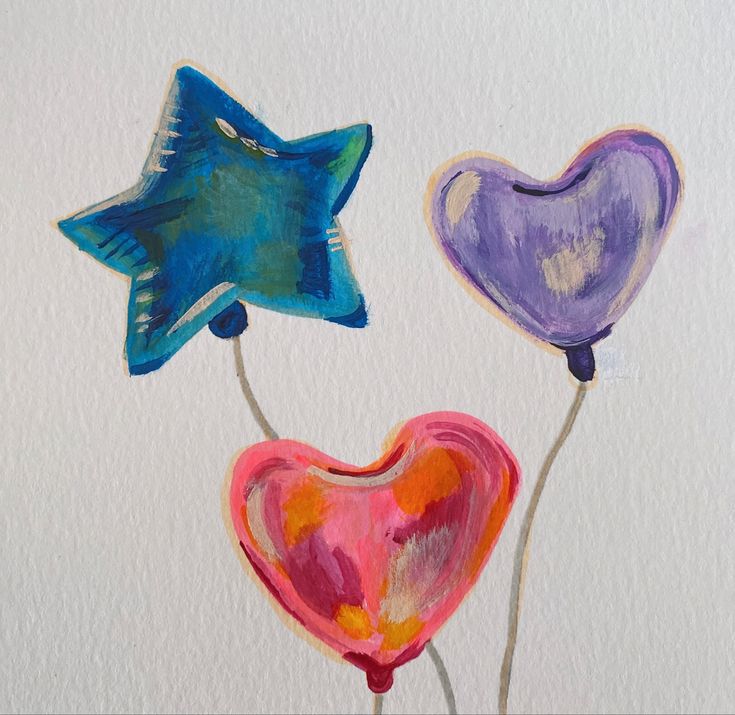 three heart shaped balloons are in the shape of stars