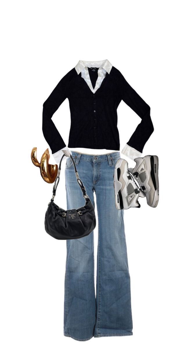 a woman is wearing jeans and a black cardigan sweater with white collared shirt