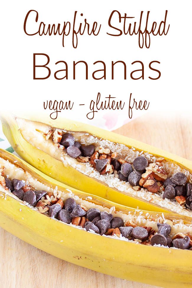 two bananas with chocolate chips on top and the words campfire stuffed bananas vegan - gluten free