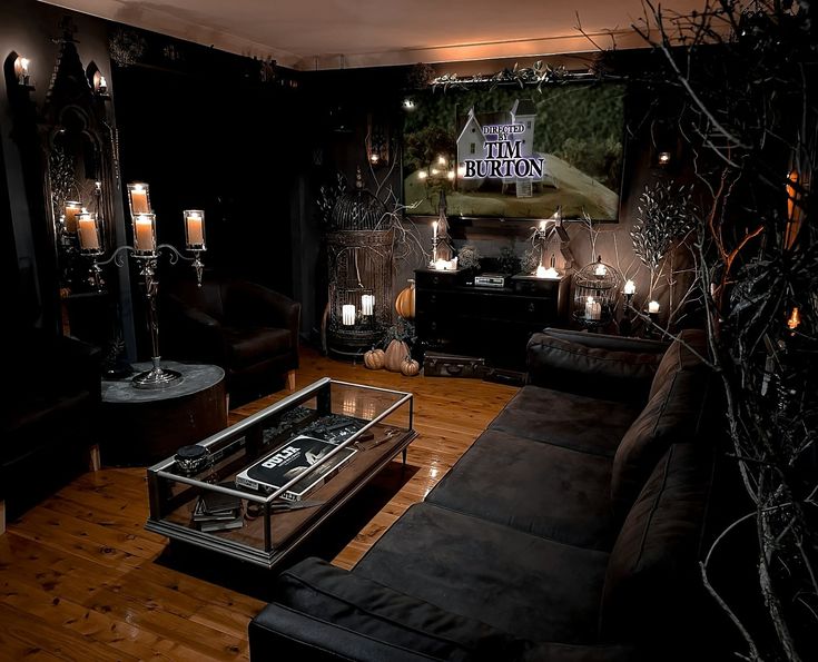 a living room filled with furniture and candles