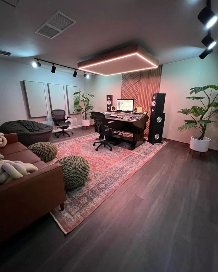 a living room filled with furniture and a large rug