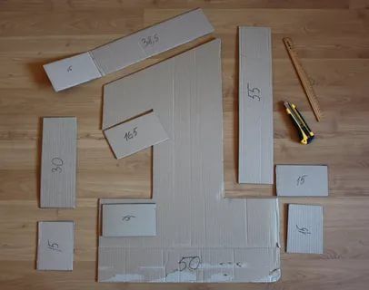 several pieces of cardboard are laid out on the floor