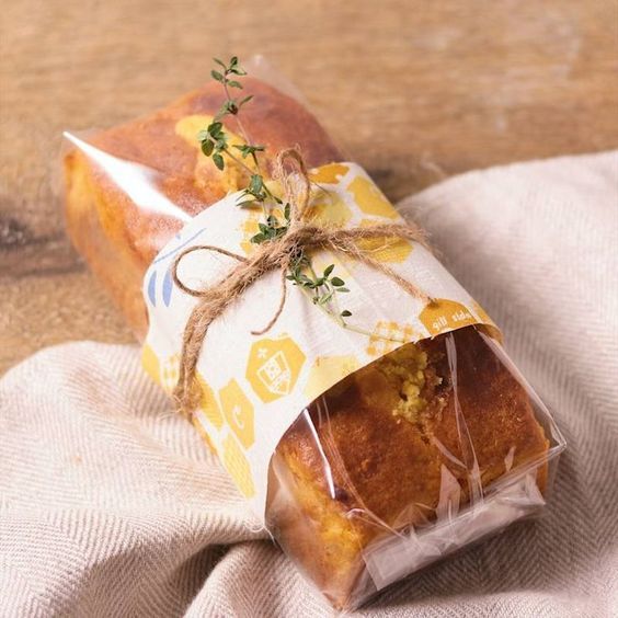 a piece of bread wrapped in plastic on top of a table