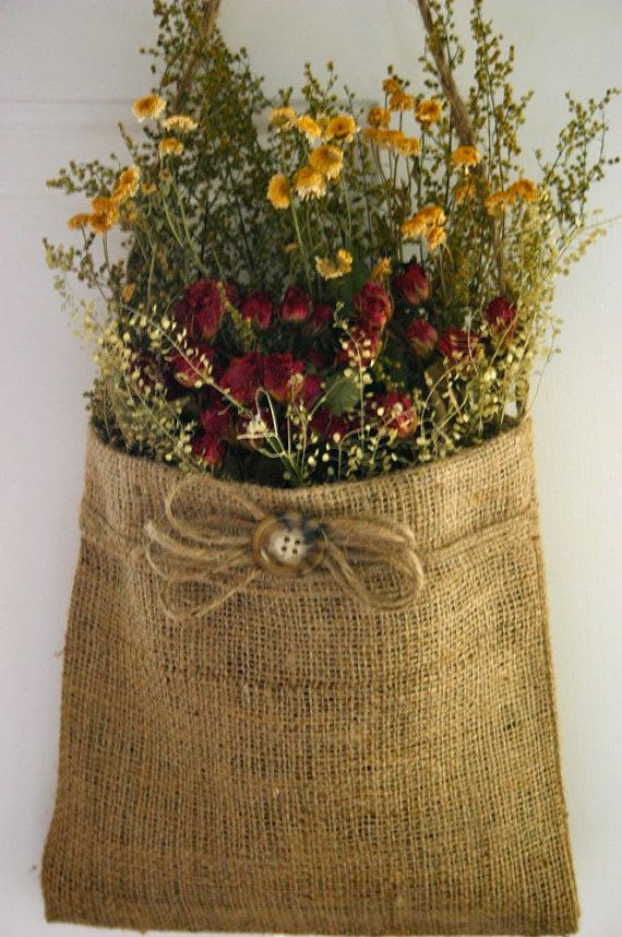 a burlock bag with flowers in it