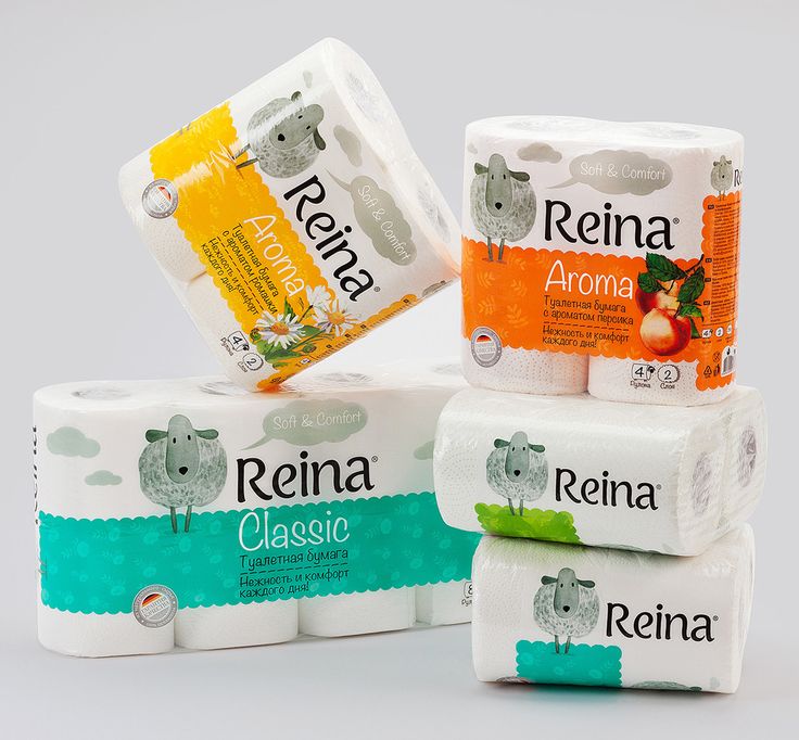 three rolls of toilet paper stacked on top of each other with the words reina written on them