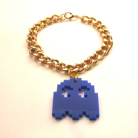 Pac Man style blue laser-cut acrylic Ghost charm, hanging from a chunky gold tone curb chain bracelet. Pac Man Ghost, Funky Jewellery, Charm Ideas, Jewellery Boutique, Blue Laser, Laser Ideas, Curb Chain Bracelet, Laser Cut Jewelry, Resin Jewellery