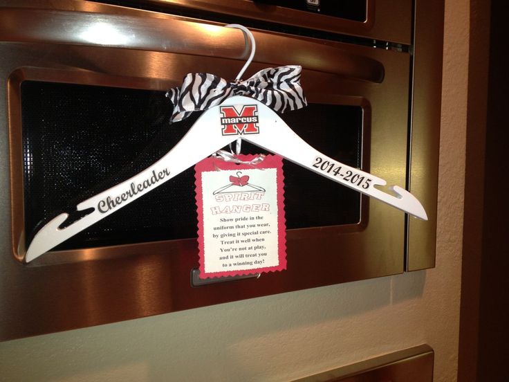 an oven door is decorated with a ribbon