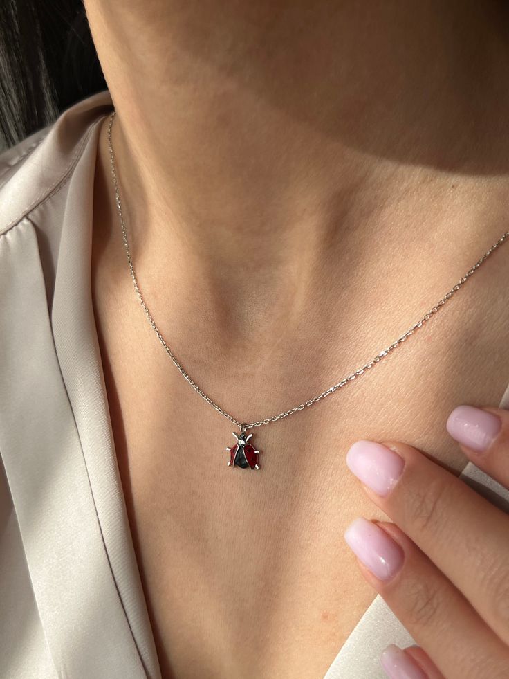 Cute ladybug to get some luck 🐞 Available in 925K Sterling Silver, with captivating finishes in Gold, Rose Gold, or White Gold plating, each piece exudes its own unique charm and sophistication. Perfect for anyone seeking a touch of beauty and style 💙 ✨ Highlights ✨ * Crafted with expertise from 925K Sterling Silver and plated with 14K Gold, Rose Gold, or White Gold, our pieces are designed to endure. * Enjoy the perfect fit for any occasion with a chain length of approximately 18 inches (16 + Beetle Jewelry, Ladybug Necklace, Cute Ladybug, Lady Beetle, Jewelry Minimalist, Minimalist Gifts, Unique Charms, Chain Lengths, Sterling Silber