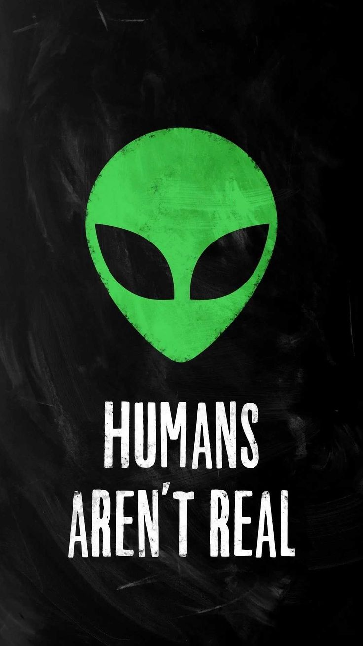 an alien head with the words humans aren't real