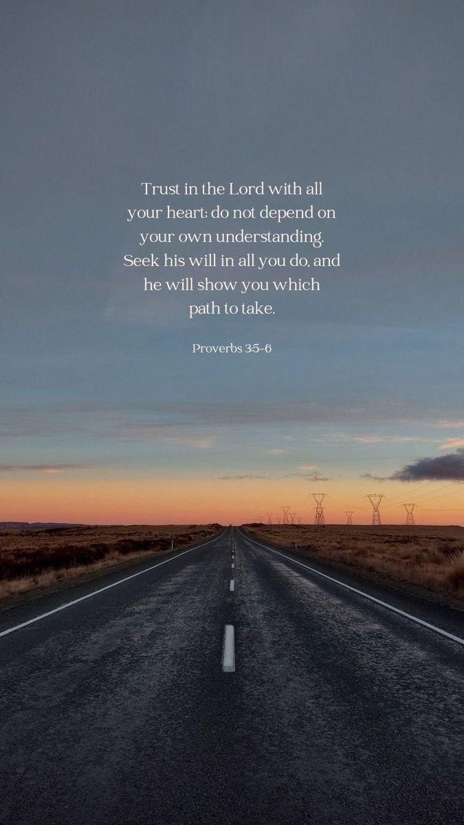 an empty road with the words trust in the lord