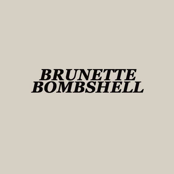 the words brunette bombshell are in black on a light gray background,