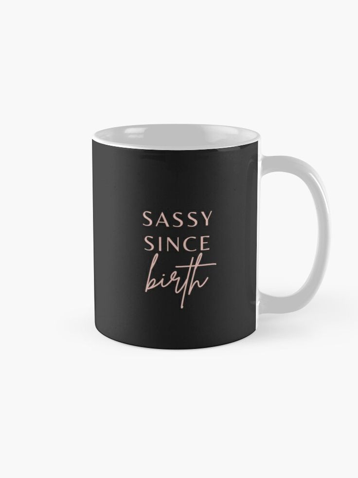 a black and white coffee mug with sassy since birth written on the side in pink