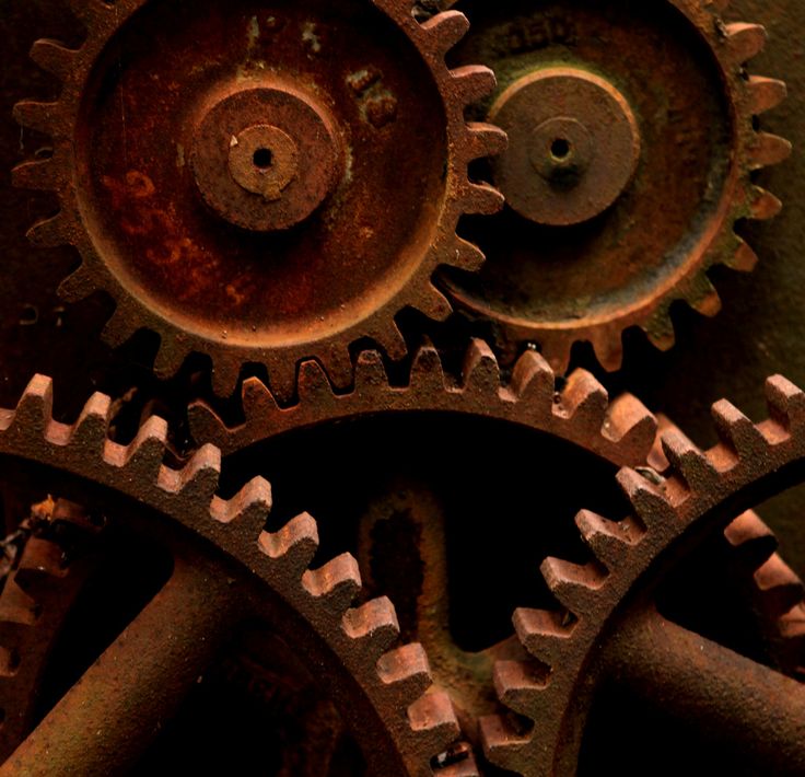 the gears of an old machine are rusted