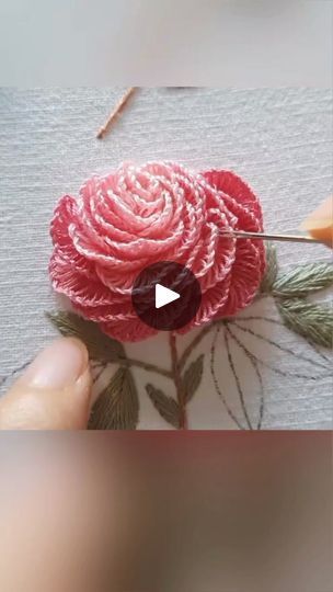 someone is painting a flower with acrylic paint