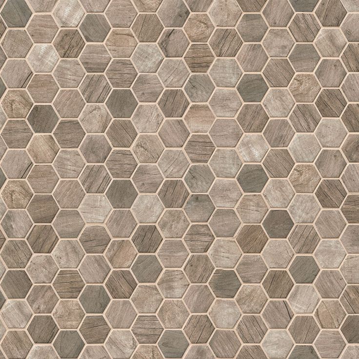 an image of a tile pattern that looks like hexagonals on the floor