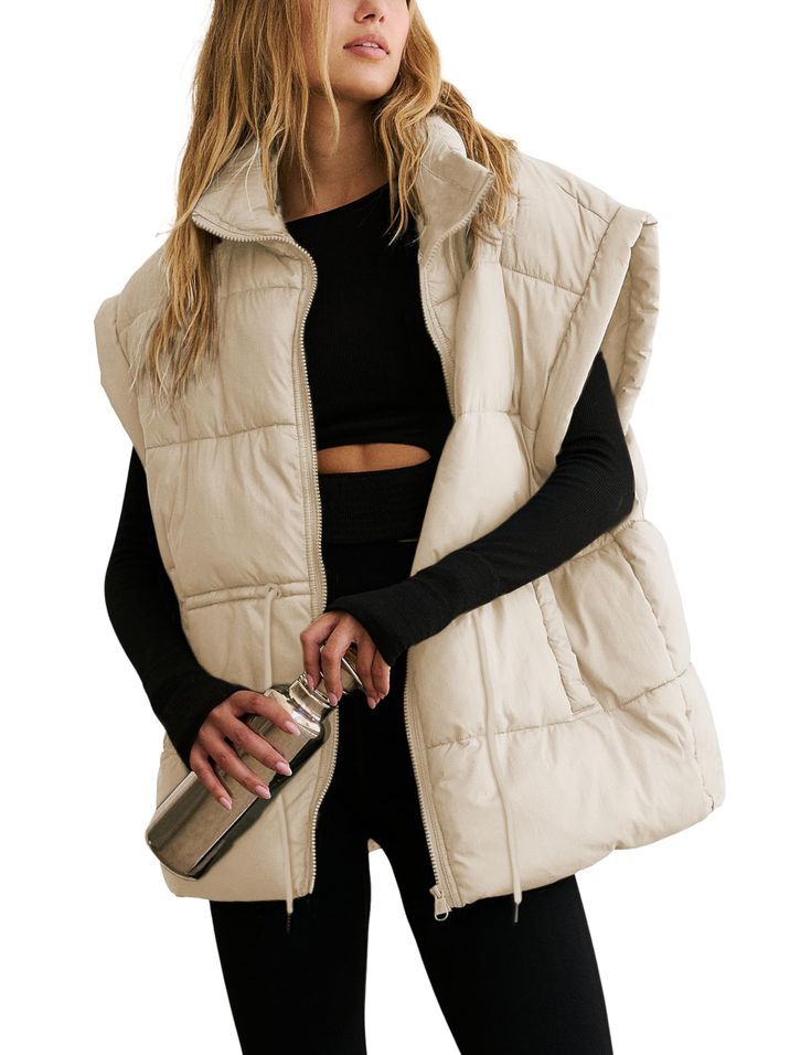 PRICES MAY VARY. Material: classic versatile puffy vest for women, lightweight warm black sleeveless padded gilet, made of soft, skin-friendly high quality polyester fabric, comfy to wear, keeping you warm during chilly days Features: womens full zip thick quality padded vest, adjustable drawstring waistband, stand collar, two side pockets, slight exaggerated shoulders, solid color, oversized style with a slouchy fit, stylish basic sleeveless padded coat allows most types of bodyshape Matching: Oversized Puffer Vest, Winter Puffer Vest, Brown Zip Ups, Oversized Puffer, Padded Vest, Quilted Puffer Vest, Black Puffer Vest, Winter Vest, Black Puffer Jacket