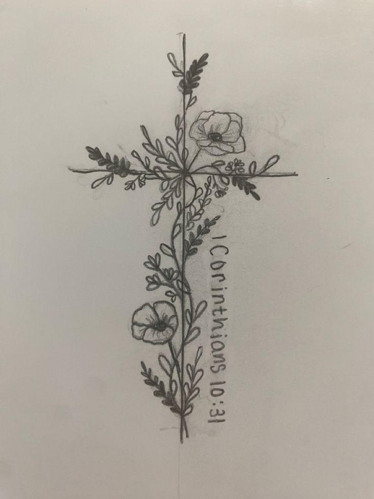 a cross with some flowers on it