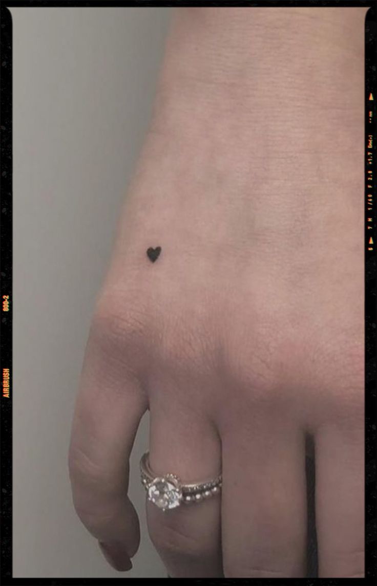 small heart tattoo Small Brown Heart Tattoo, Heart Hand Tattoos For Women, Hart Tattoo, Small Heart Tattoo, Little Heart Tattoos, Black Heart Tattoos, Love Heart Tattoo, Tiny Tats, Small Heart Tattoos