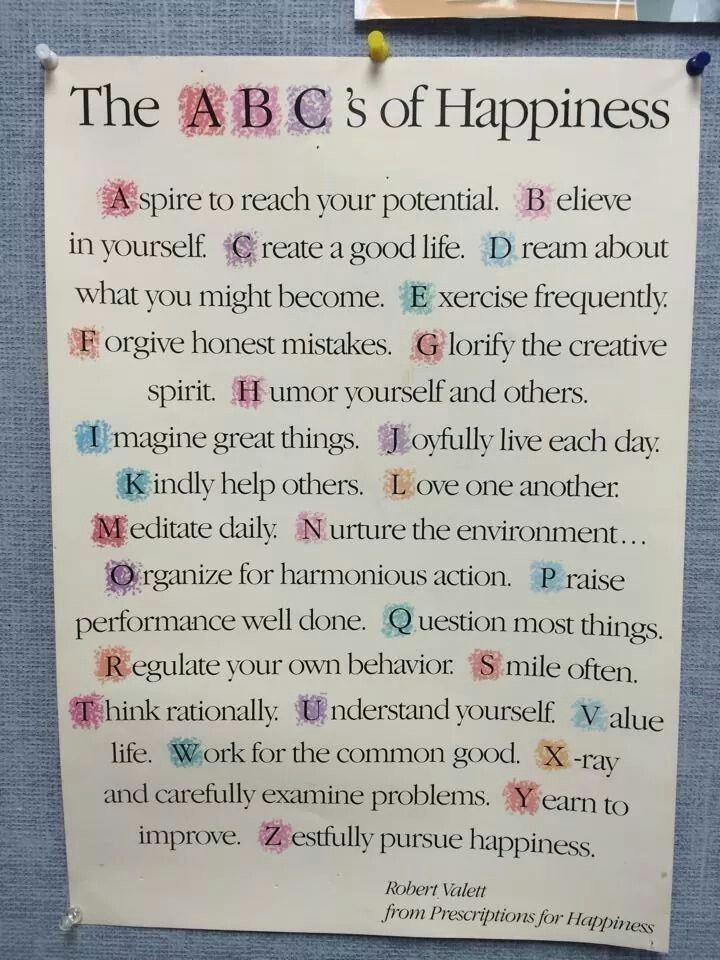 a piece of paper with writing on it hanging from a bulletin board that says the abc's of happiness