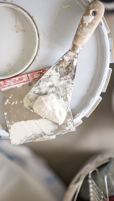 a white plate with some paint on it