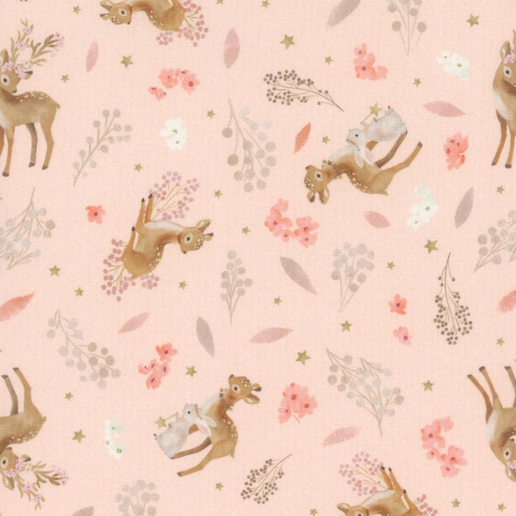 a pink fabric with deers and flowers on the side, in front of a light pink background