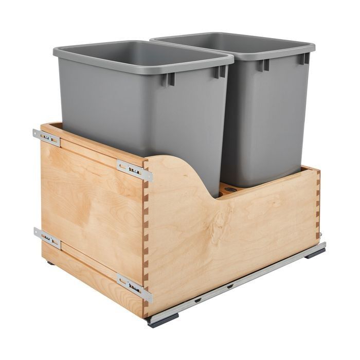 two plastic bins sitting on top of a wooden box