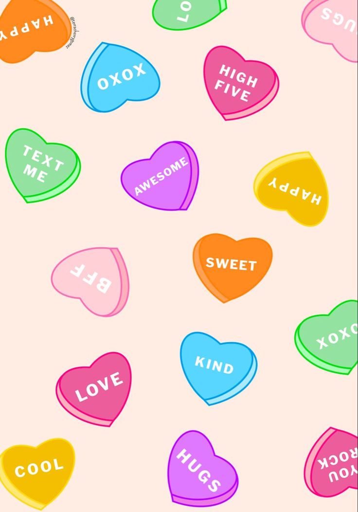 candy hearts are arranged in different colors and sizes on a pink background with words that spell out