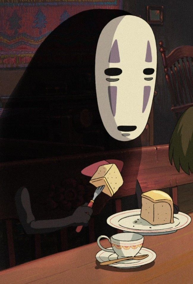 an animated image of a person eating food with a mask on their head and another face in the background