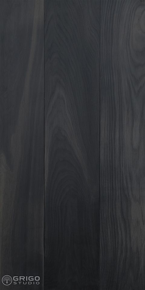 black wood paneling with dark stain on the top and bottom part, in an angled position