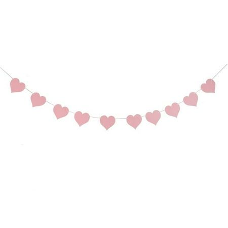 a pink heart garland hanging from a string