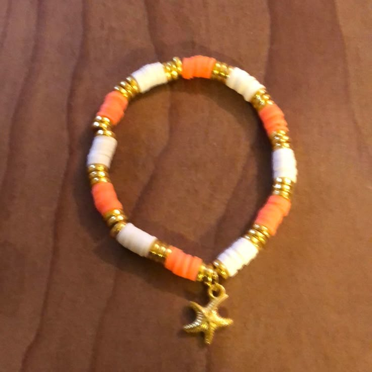 Hand Crafted Clay Bead Bracelet With Star Fish Charm. Orange And White With Gold. Smoke Free Home. Perfect For That Beach Vacation. Patterns For Clay Bead Bracelets, Cute Orange Bracelet, Winter Clay Bracelet, Brown Clay Bracelet Ideas, Orange Clay Bracelets, Smiley Clay Bead Bracelet, Clay Bead Bracelet Ideas With Charms, Bracelet Patterns Beads Ideas, Big Bead Crafts