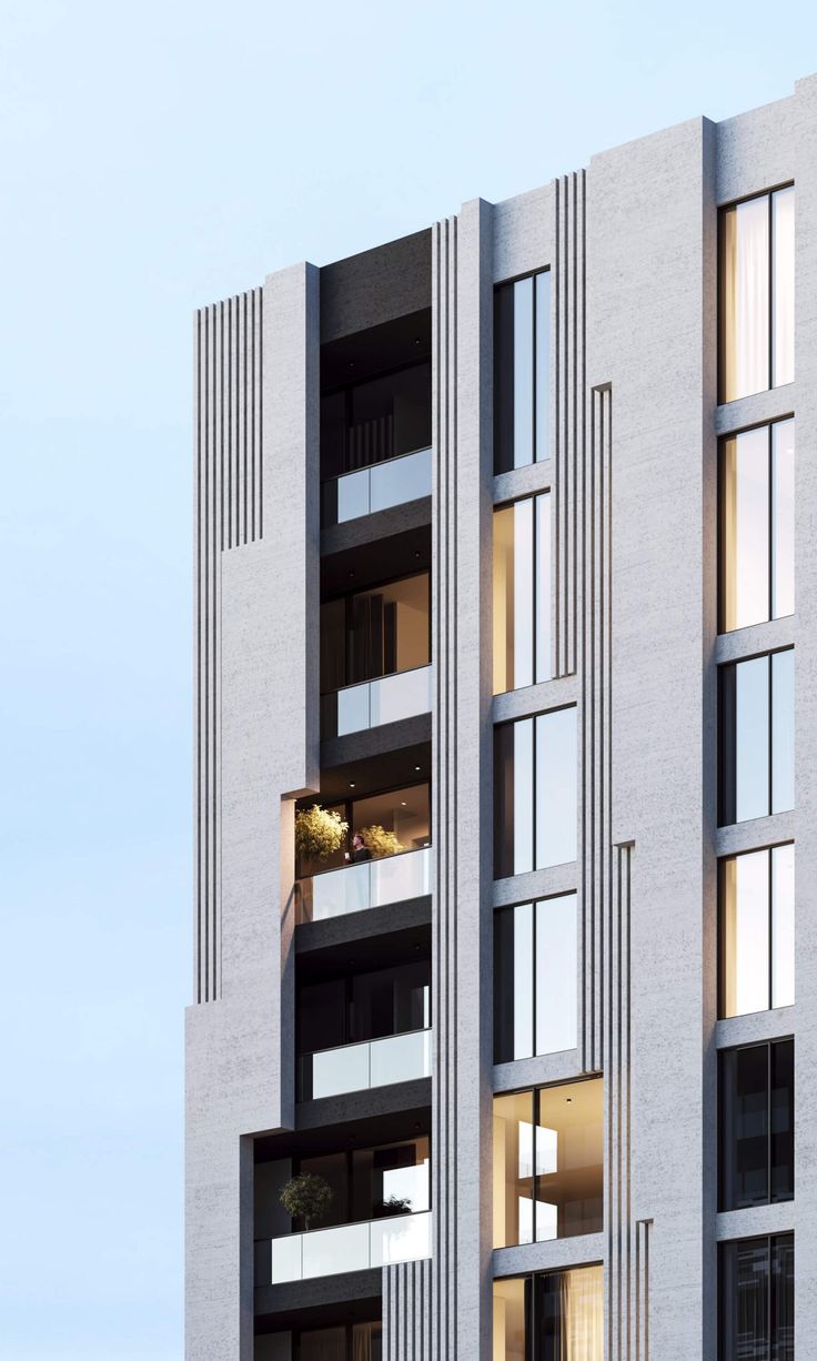 an apartment building with multiple balconies and windows