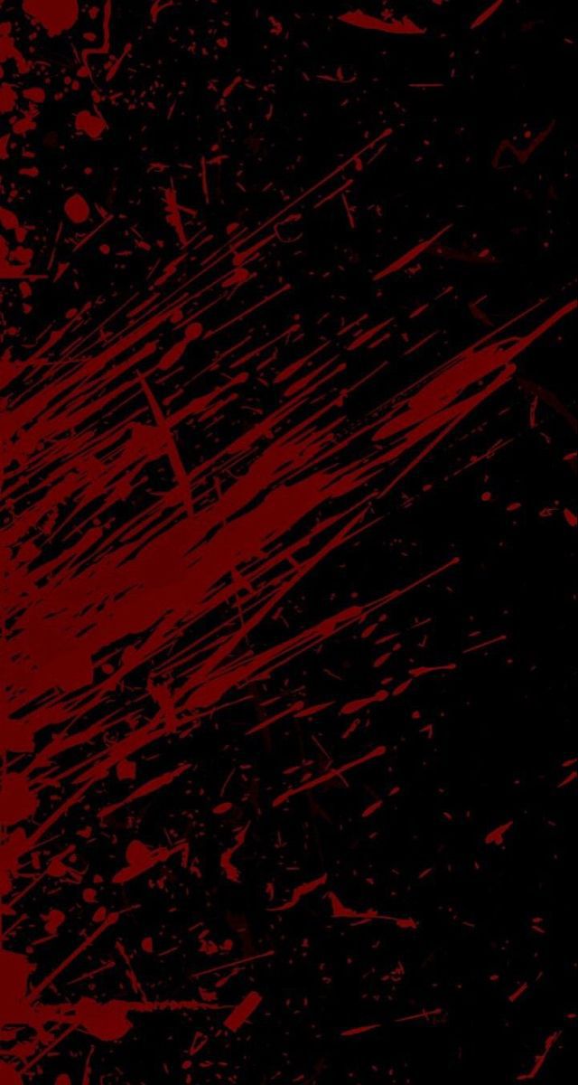 a black and red background with paint splattered on the bottom half of it