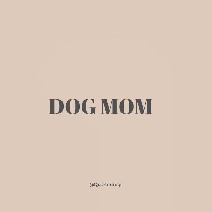 the word dog mom written in black on a beige background