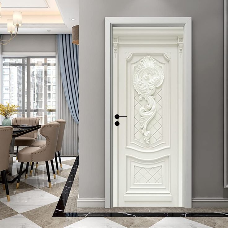 a white door in the middle of a dining room