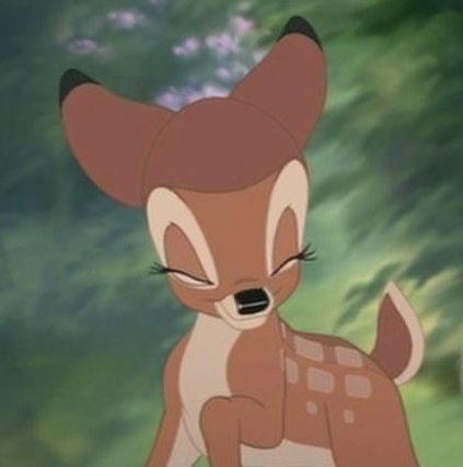 an animated image of a baby deer standing in the woods with its eyes closed and nose wide open