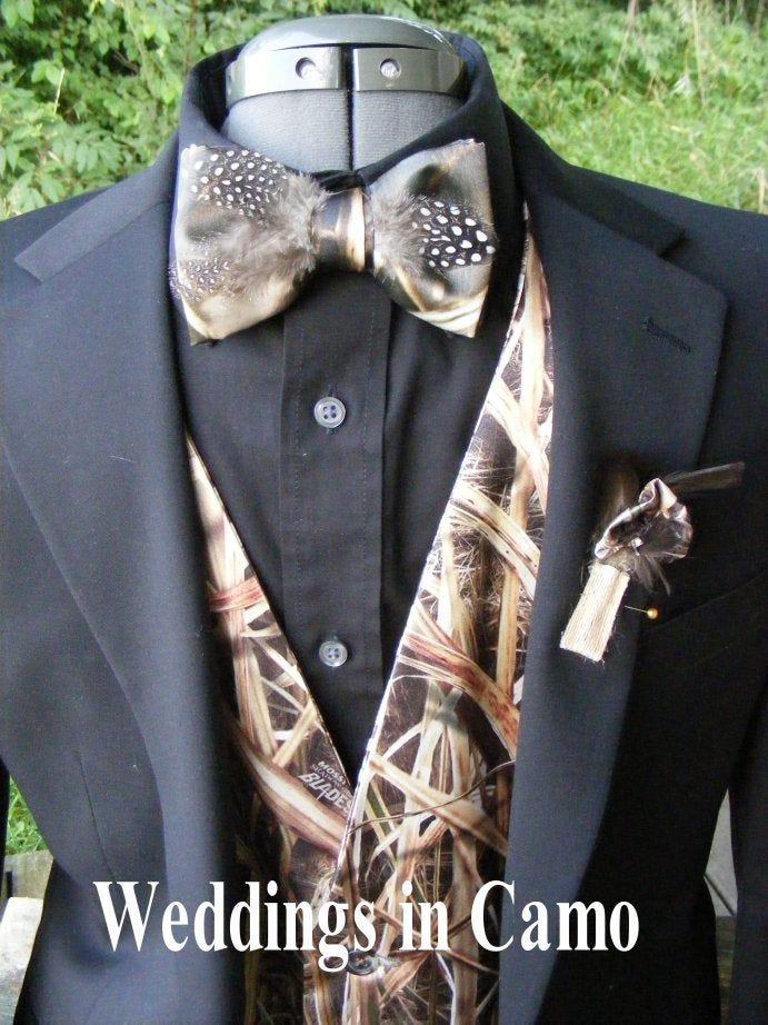 a man wearing a suit and bow tie with the words wedding in camo on it