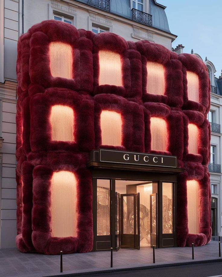 a building that looks like it is made out of fake furs and has the words gucci in front of it