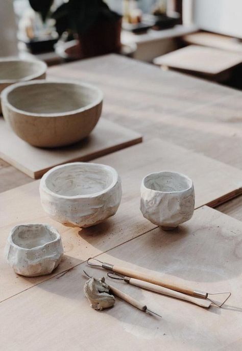 bowls and tools are sitting on the table