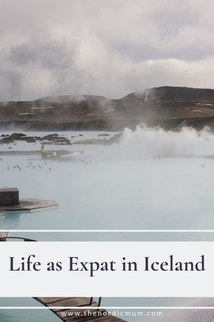 the blue lagoon in iceland with steam rising from it