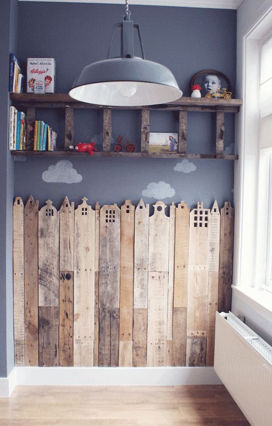 a room that has some wooden boards on the wall and shelves in front of it