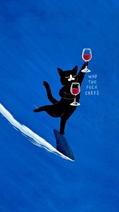 a black cat holding two glasses of wine on top of a surfboard in the ocean