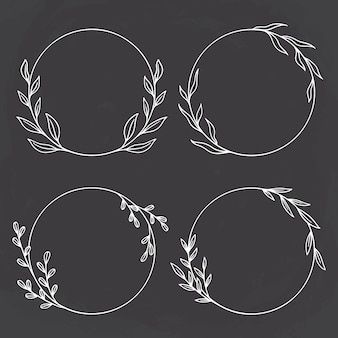 four circular frames with leaves and branches drawn in chalk